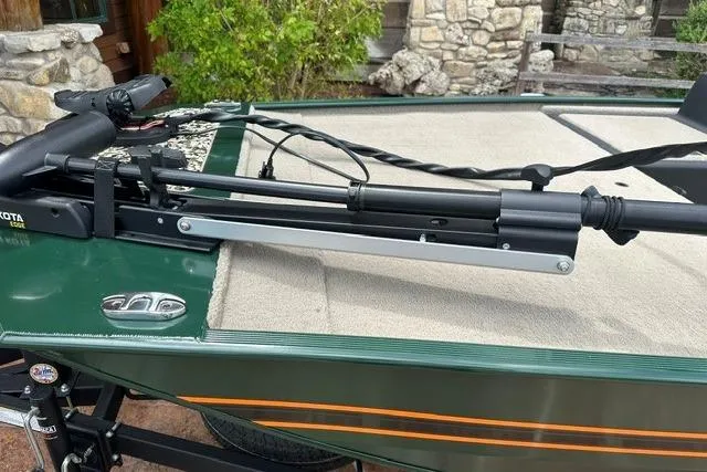 Slide: The Image of 2026 Tracker Bass Tracker Classic Limited boat with trolling motor on deck. - 4