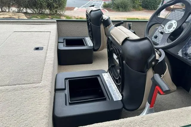 Slide: The Image of Interior of 2026 Tracker Bass Tracker Classic Limited boat with seating and storage compartments. - 9
