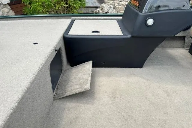 Slide: The Image of 2026 Tracker Bass Tracker Classic Limited boat interior with carpeted storage compartments. - 12