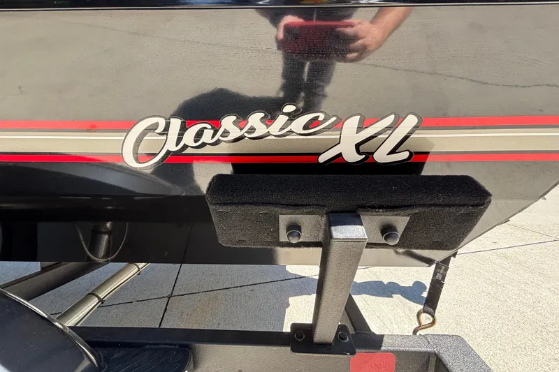 Slide: The Image of 2026 Tracker Bass Tracker Classic XL boat with logo and red stripe detailing. - 33
