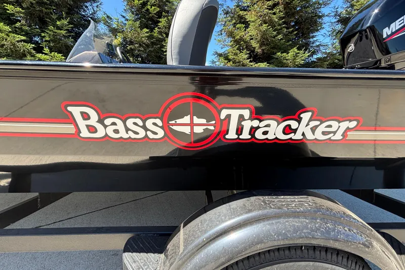 Slide: The Image of 2026 Tracker Bass Tracker Classic XL boat logo on black exterior. - 37