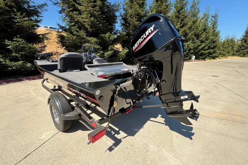 Slide: The Image of 2026 Tracker Bass Tracker Classic XL boat with Mercury engine on trailer. - 5