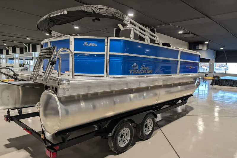Slide: The Image of 2026 Sun Tracker Party Barge 20 DLX pontoon boat in showroom. - 71