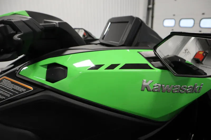 Slide: The Image of 2023 Kawasaki 310LX-S Ultra jet ski, vibrant green, close-up view. - 18