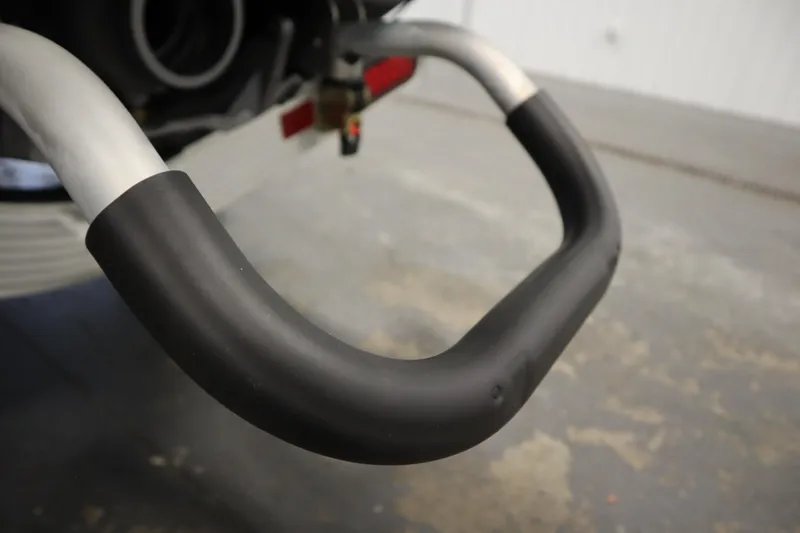 Slide: The Image of Close-up of 2023 Kawasaki 310LX-S Ultra handlebar with black grip. - 26