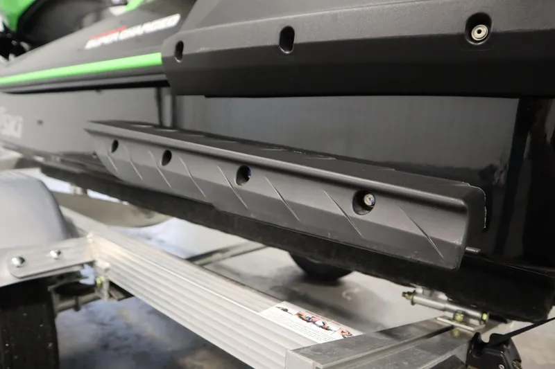 Slide: The Image of 2023 Kawasaki 310LX-S Ultra jet ski on a trailer, close-up view. - 27
