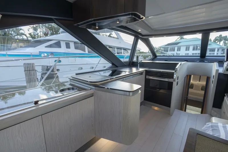 Slide: The Image of Modern interior of 2023 Azimut S6 Sport-Fly yacht with sleek kitchen design. - 20