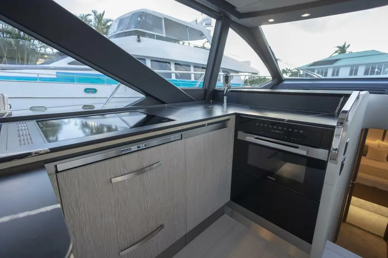 Slide: The Image of Modern kitchen interior of 2023 Azimut S6 Sport-Fly yacht with sleek appliances. - 21