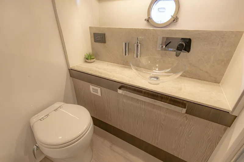 Slide: The Image of Luxurious bathroom in 2023 Azimut S6 Sport-Fly yacht with modern fixtures and elegant design. - 32