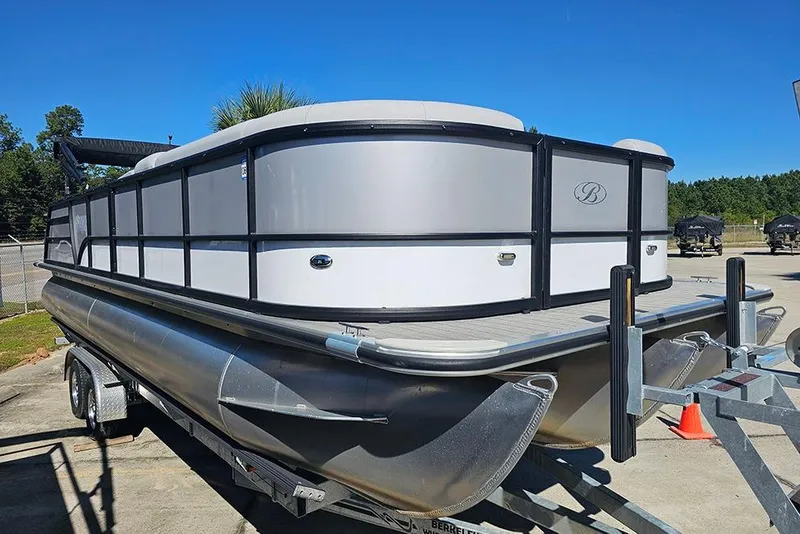 Slide: The Image of 2023 Bentley Pontoons 243 Legacy Swingback (Sport3) on trailer, sunny day, outdoor setting. - 3