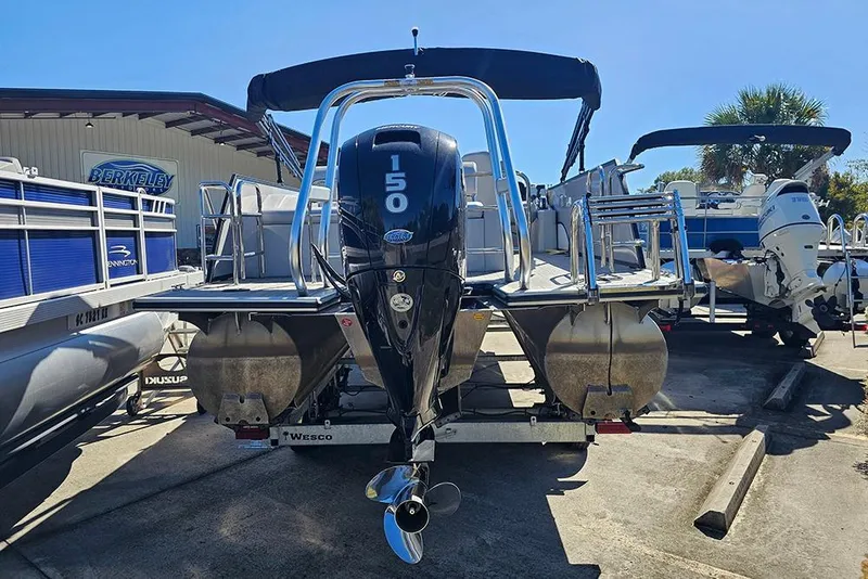 Slide: The Image of 2023 Bentley Pontoons 243 Legacy Swingback with 150 HP engine at dealership. - 5