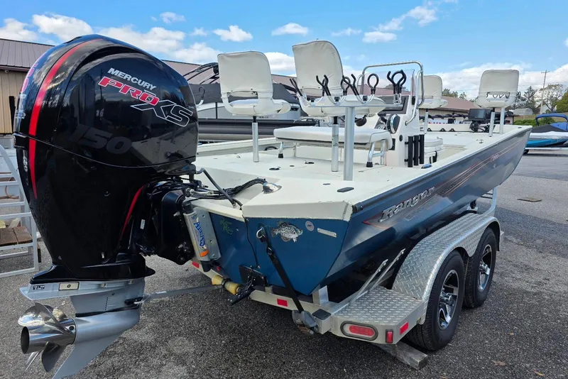 Slide: The Image of 2022 Ranger RB200 boat with Mercury Pro XS 150 engine on a trailer. - 3