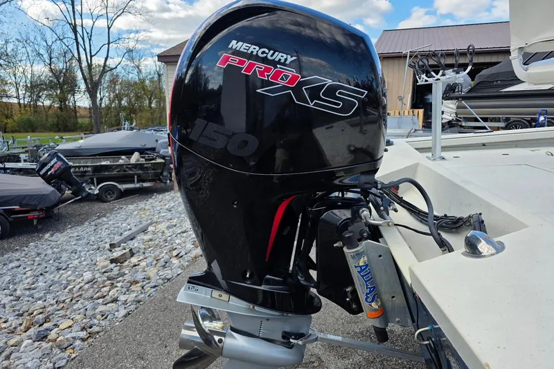 Slide: The Image of 2022 Ranger RB200 with Mercury Pro XS 150 outboard motor, parked outdoors. - 4