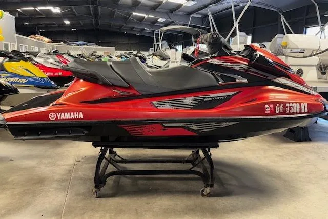 Slide: The Image of 2015 Yamaha WaveRunner VXR in a showroom, red and black design, side view. - 10