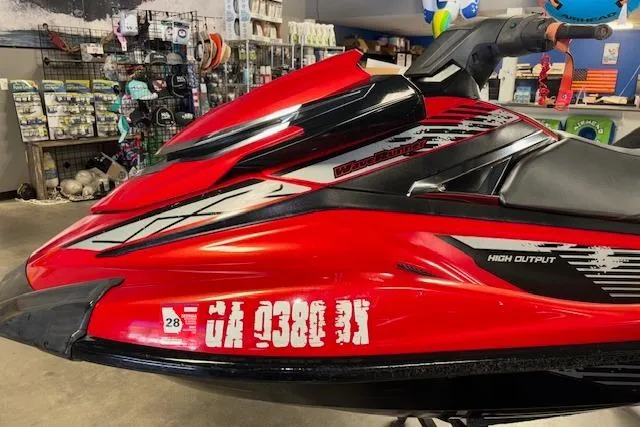 Slide: The Image of 2015 Yamaha WaveRunner VXR in a showroom, red and black design, high output model. - 4