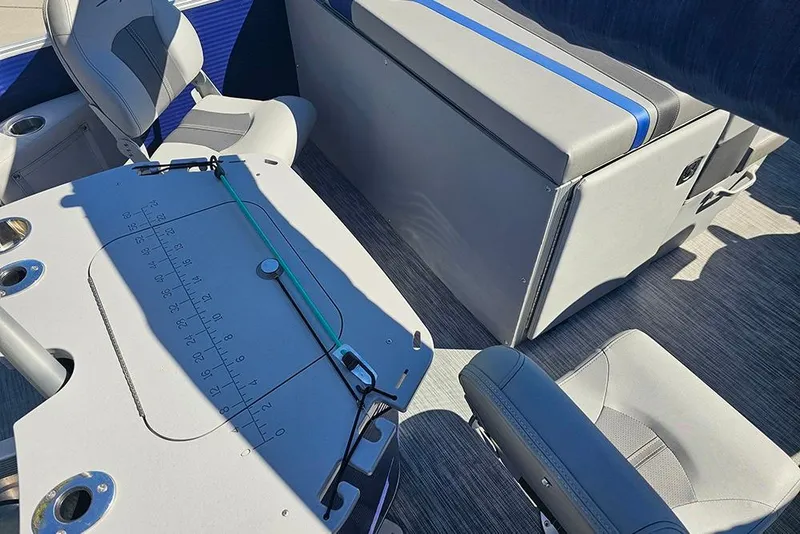 Slide: The Image of 2021 Bennington SX 22 Fishing boat interior with seating and fishing table. - 10