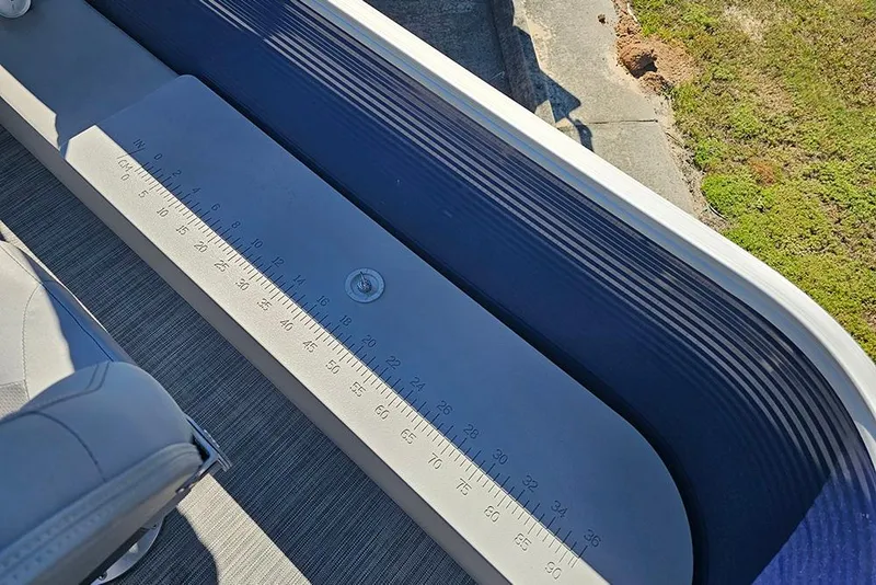 Slide: The Image of 2021 Bennington SX 22 Fishing boat with integrated measuring ruler on deck. - 13