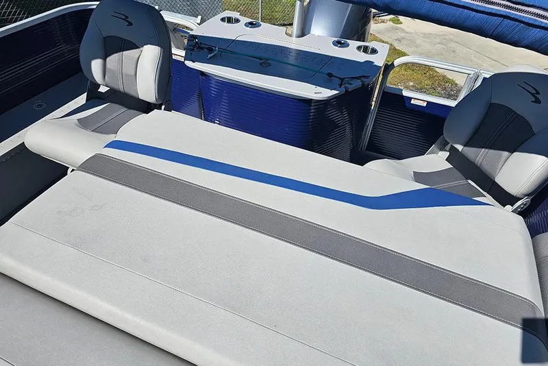 Slide: The Image of 2021 Bennington SX 22 Fishing boat interior with cushioned seating and fishing station. - 15