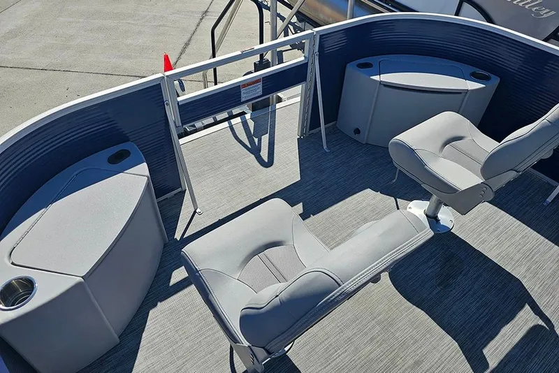 Slide: The Image of 2021 Bennington SX 22 Fishing boat interior with seating and storage compartments. - 25