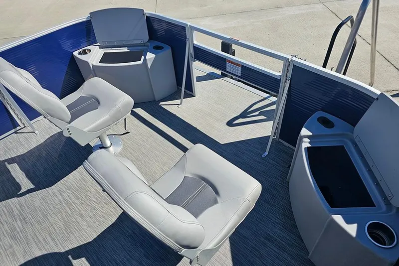Slide: The Image of 2021 Bennington SX 22 Fishing boat interior with seating and storage compartments. - 26