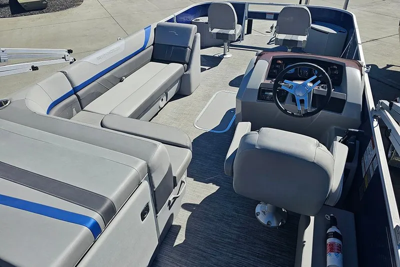 Slide: The Image of 2021 Bennington SX 22 Fishing boat interior with seating and steering console. - 9