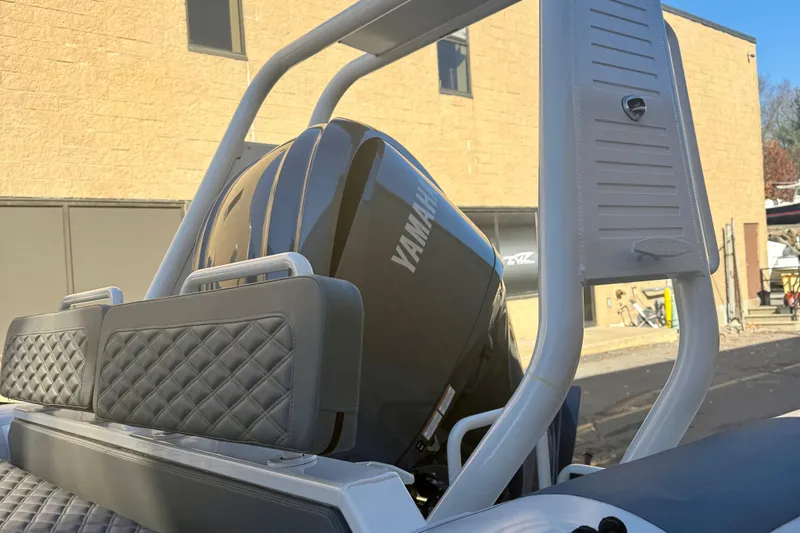 Slide: The Image of Open storage compartment on 2025 Highfield Patrol 760 boat, showing interior details. - 11