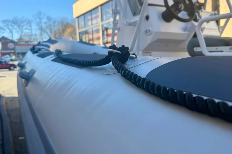 Slide: The Image of 2025 Highfield Patrol 760 boat seating with logo, featuring durable design and modern aesthetics. - 12