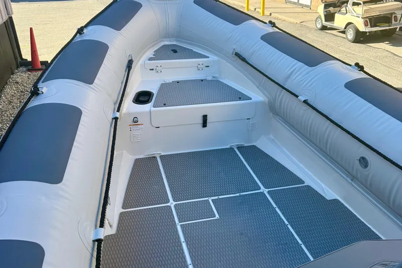 Slide: The Image of Highfield Patrol 760 boat bow with textured deck, 2025 model. - 25