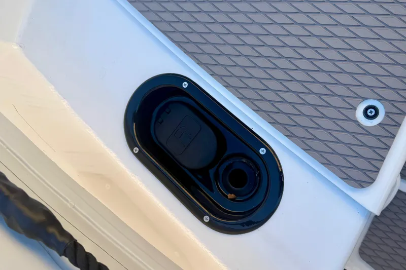 Slide: The Image of Plastic-wrapped seat inside 2025 Highfield Patrol 760 boat cabin. - 26