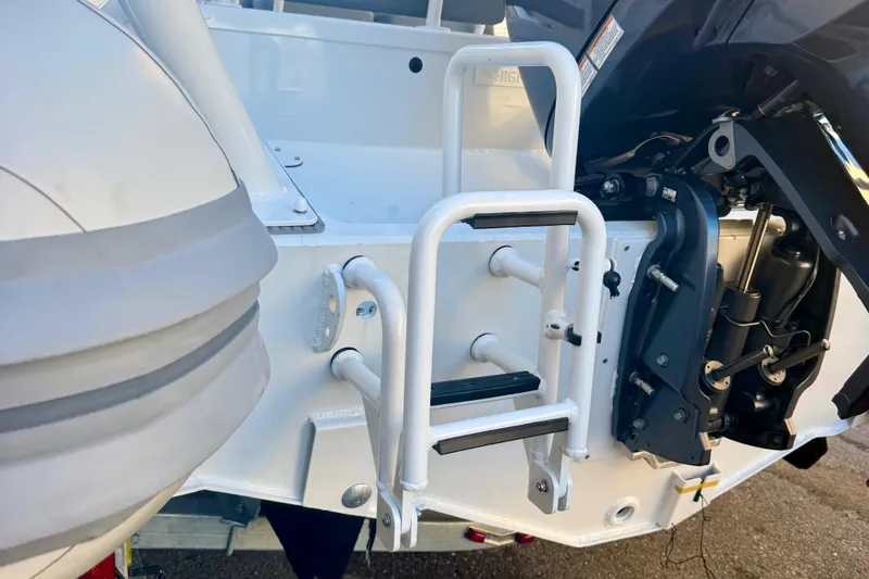 Slide: The Image of 2025 Highfield Patrol 760 boat with Yamaha engine, featuring quilted seating and sturdy frame. - 8