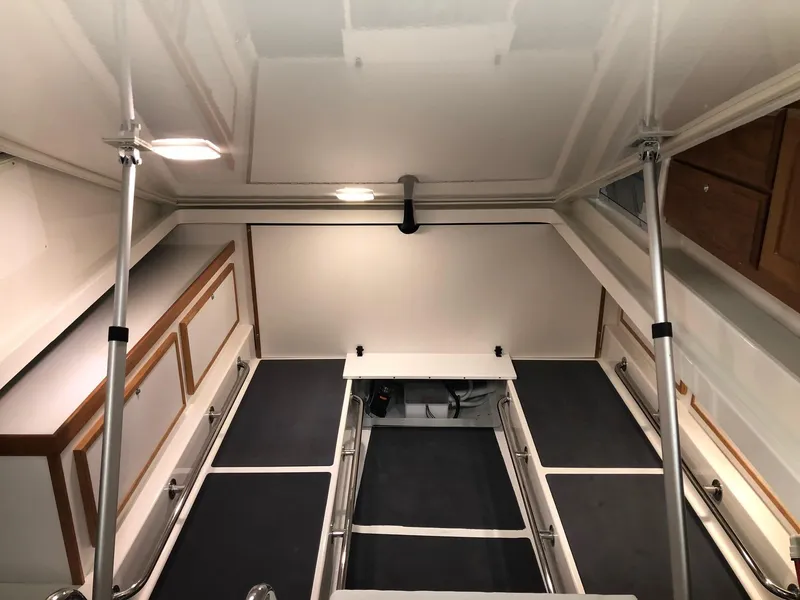 Slide: The Image of 2026 Back Cove 340 interior cabin with sleek design and modern finishes. - 20