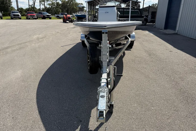 Slide: The Image of 2026 Blazer 675 Ultimate Bay boat on trailer in parking lot. - 3