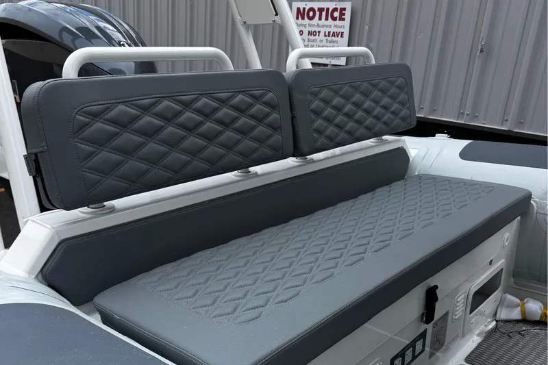 Slide: The Image of 2026 Highfield Patrol 600 boat console with speaker and safety features. - 13