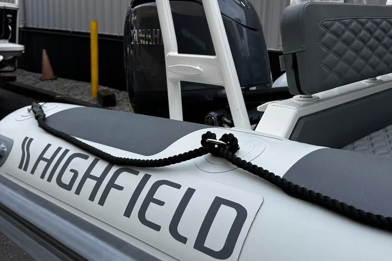 Slide: The Image of 2026 Highfield Patrol 600 boat with Yamaha engine, featuring sleek design and branding. - 17