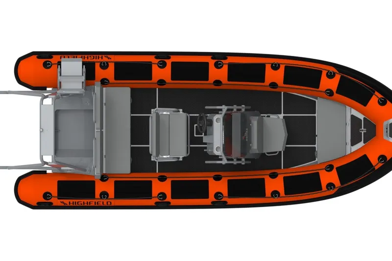 Slide: The Image of 2026 Highfield Patrol 600 boat on trailer, parked outside a metal building. - 3