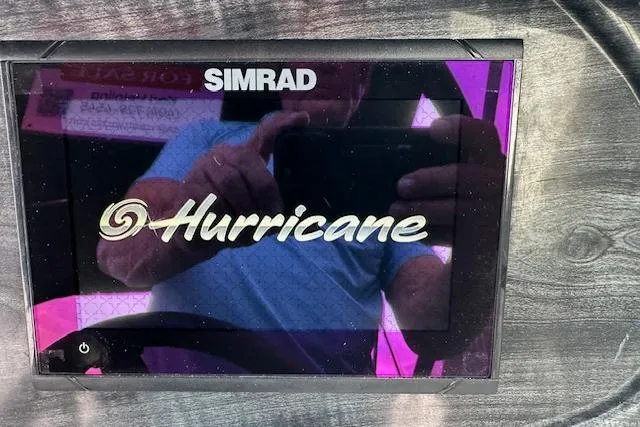Slide: The Image of Simrad display on 2019 Hurricane SunDeck 2410 OB boat dashboard. - 8