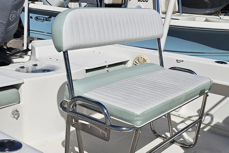 Slide: The Image of White and mint green boat seat on 2016 Sundance DX20. - 10