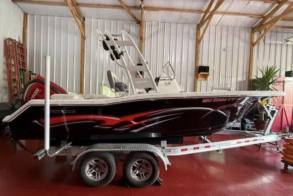 The Image of 2017 Tidewater 210 LXF boat on trailer in indoor storage facility. - 1
