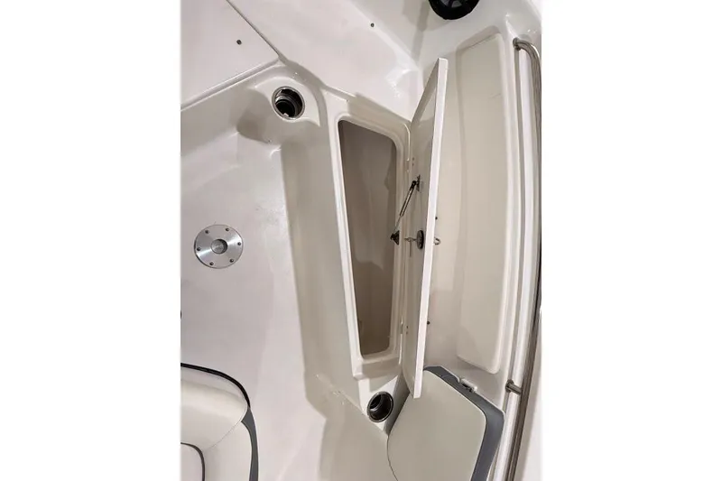 Slide: The Image of 2017 Tidewater 210 LXF boat interior storage compartment with open hatch. - 17