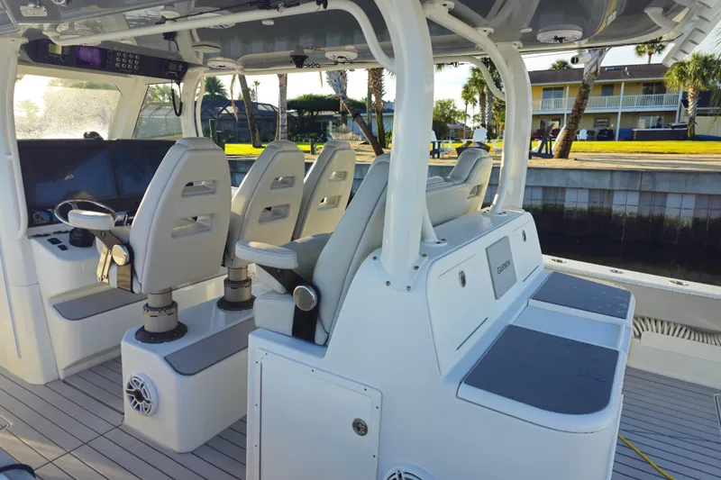 Slide: The Image of Interior of a 2022 Freeman 47 boat with modern seating and navigation equipment. - 3