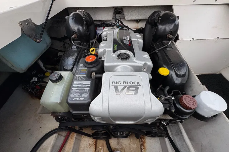 Slide: The Image of 2013 Sea Ray 280 Sundeck engine compartment with Big Block V8 engine. - 18