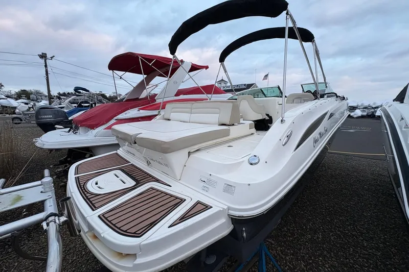 Slide: The Image of 2013 Sea Ray 280 Sundeck boat with sleek design and spacious seating. - 5