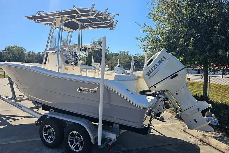 Slide: The Image of 2019 Bulls Bay 200 CC boat with Suzuki outboard motor on trailer. - 3