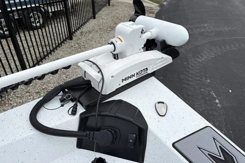 Slide: The Image of 2026 Xpress H20B Bay boat with Minn Kota Terrova trolling motor on deck. - 6