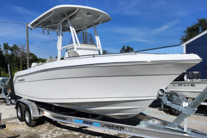 The Image of 2025 Savannah 2200 Offshore boat on trailer, sleek design, ready for adventure. - 1