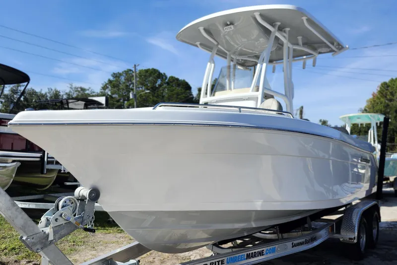 Slide: The Image of 2025 Savannah 2200 Offshore boat on trailer, sleek design, ready for adventure. - 3