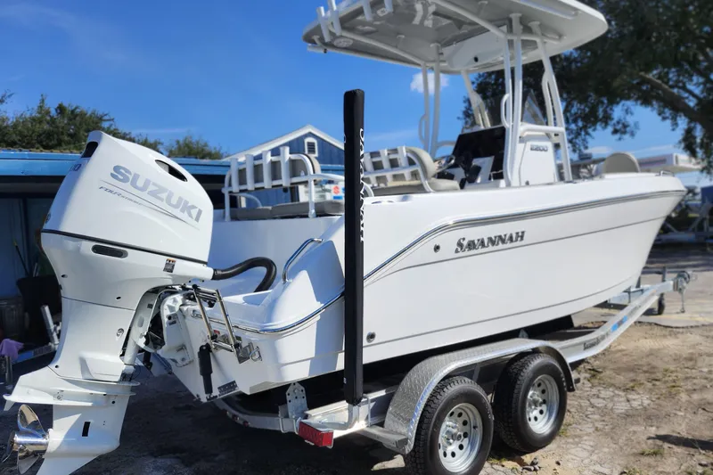 Slide: The Image of 2025 Savannah 2200 Offshore boat with Suzuki engine on trailer. - 6