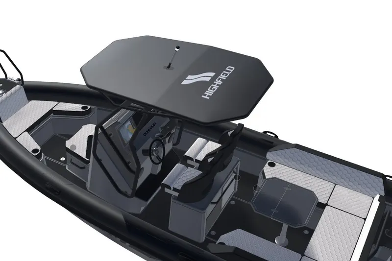 Slide: The Image of 2026 Highfield ADV7 boat with sleek design, modern seating, and canopy. - 2