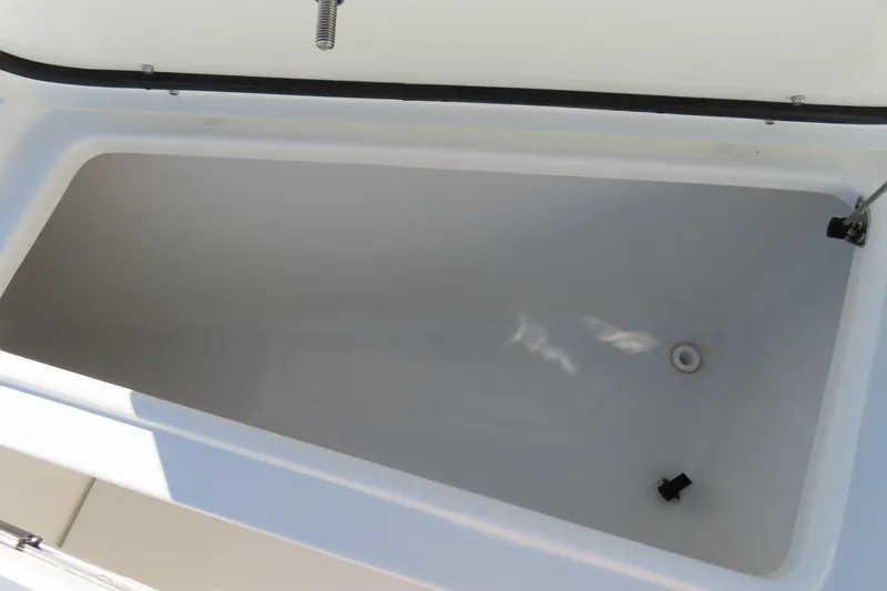 Slide: The Image of Open storage compartment on 2025 Sea Hunt Gamefish 27 Forward Seating boat. - 15