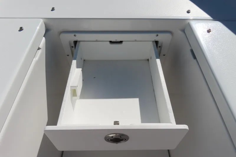 Slide: The Image of Open storage compartment on 2025 Sea Hunt Gamefish 27 Forward Seating boat. - 16